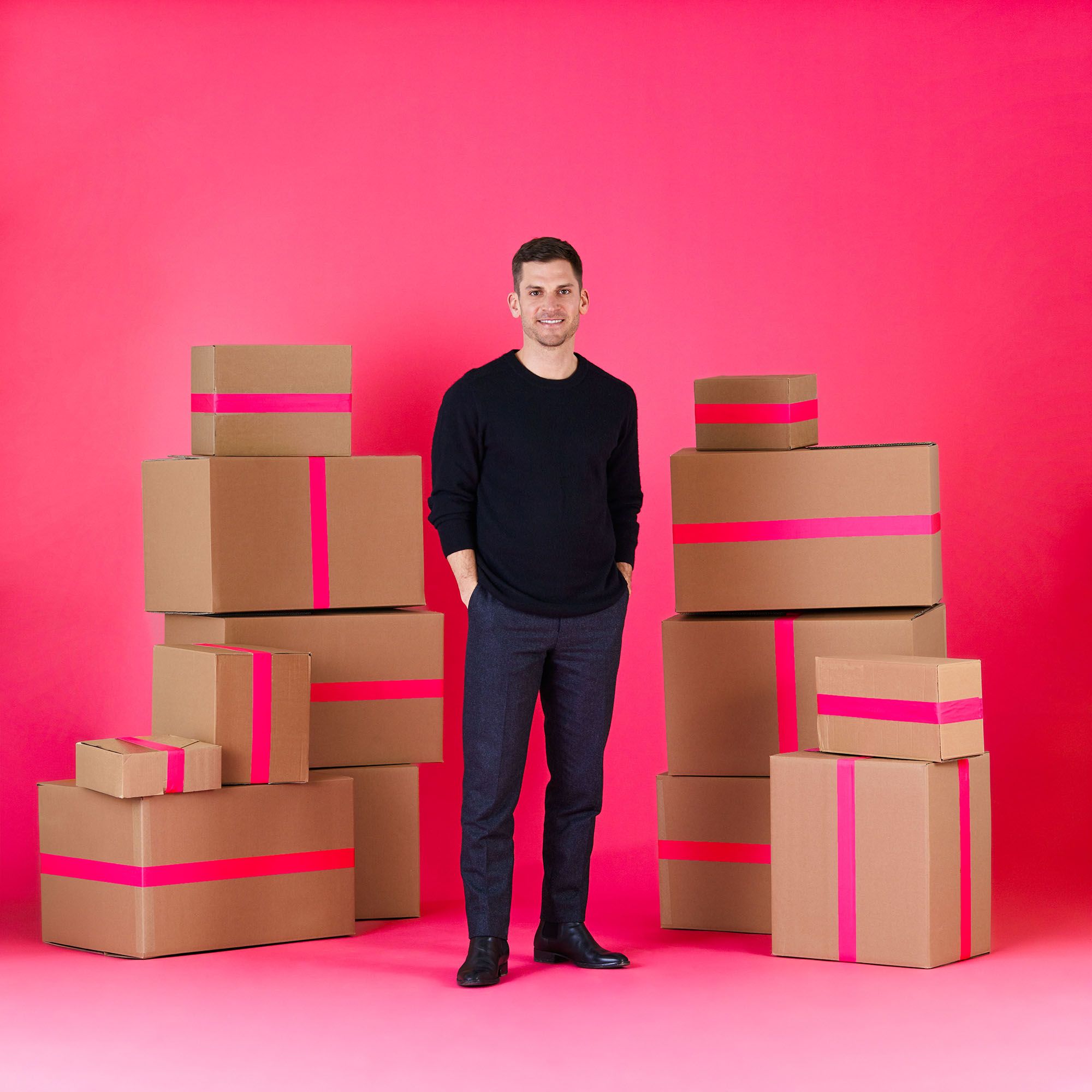 Founder in front of boxes