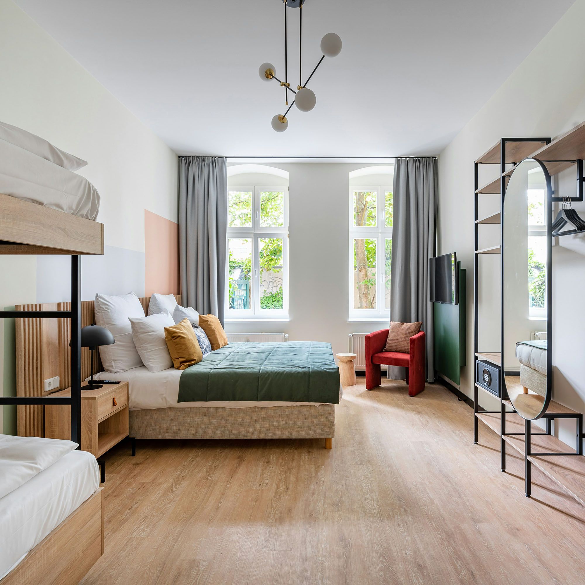 Man seen from behind standing in a contemporary art gallery