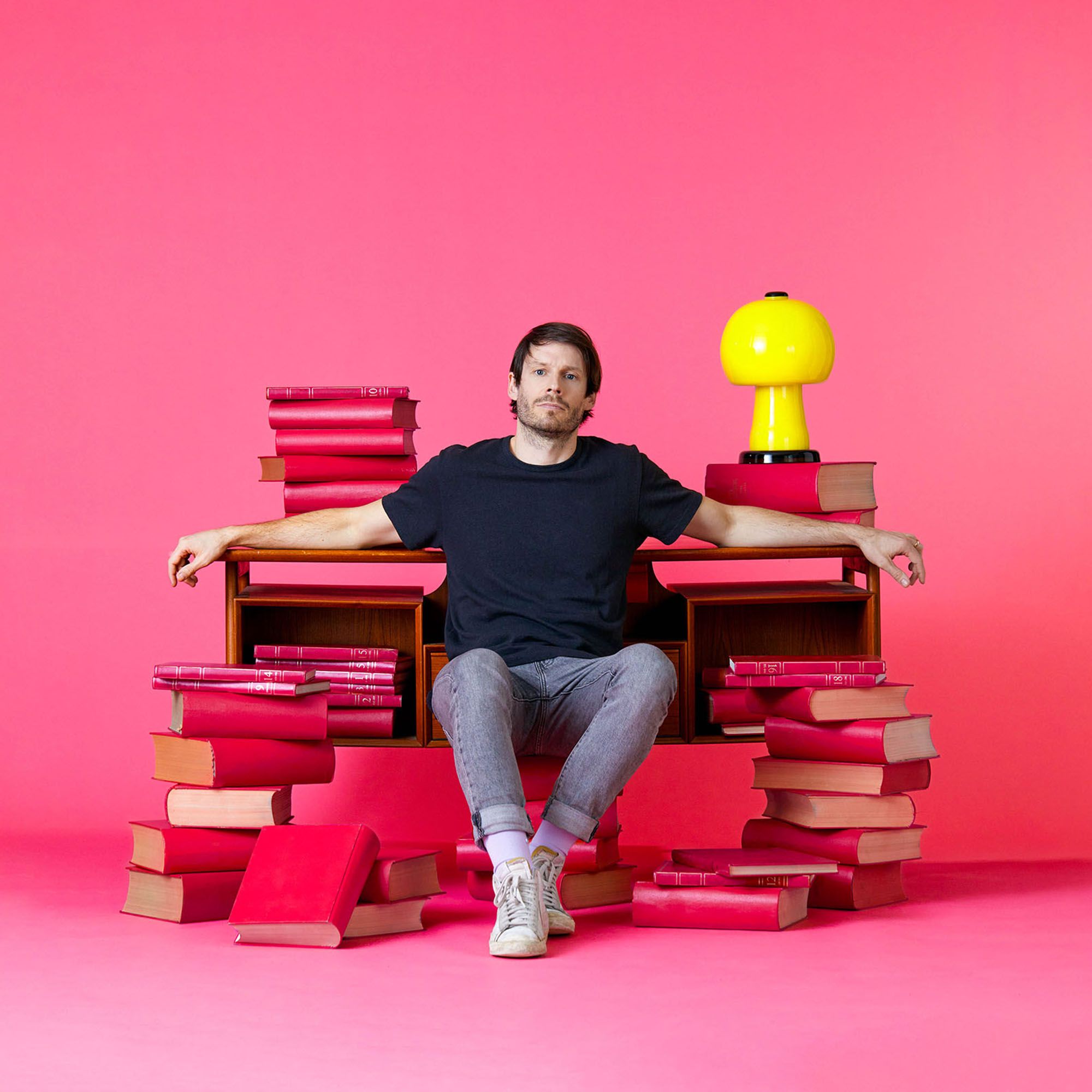 Founder with textbooks