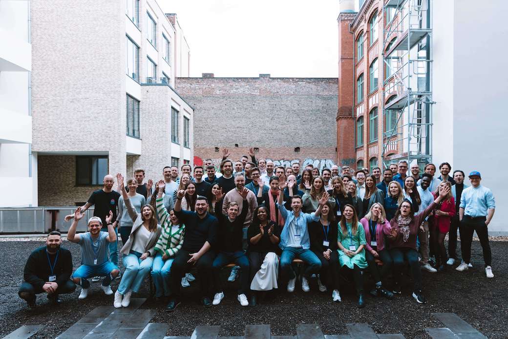 Group of people between two buildings