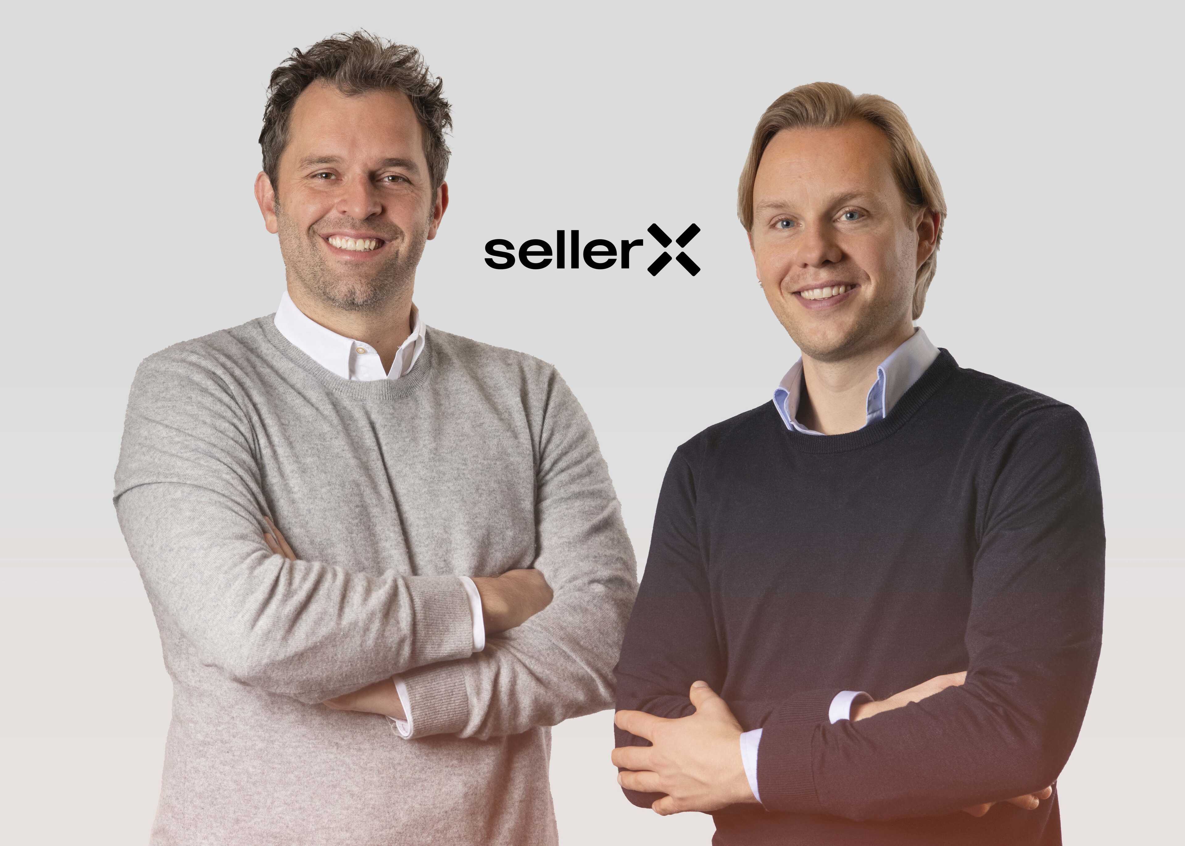 Two men looking at the camera smiling